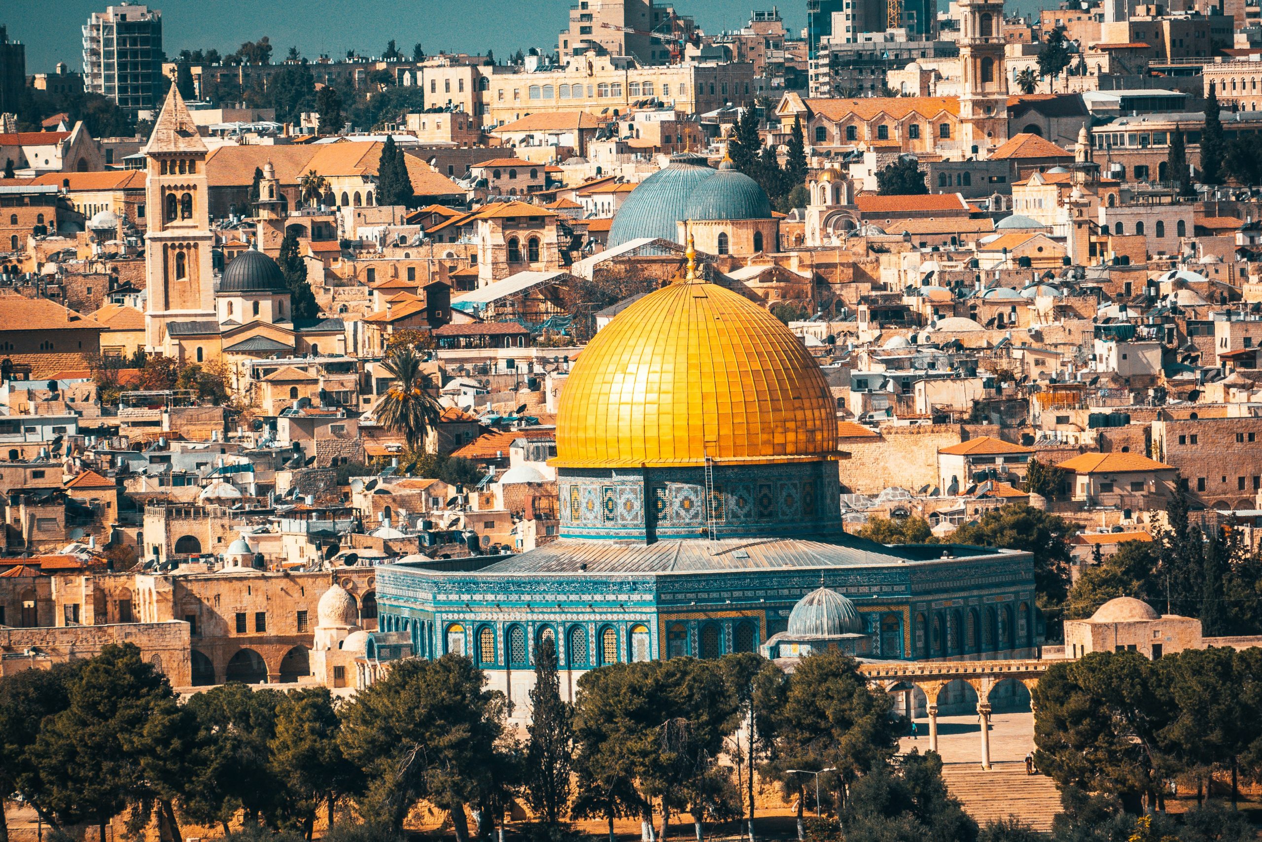 Jerusalem Half Day Tour aerial view over the Old City of Jerusalem rooftops with Dome of the Rock and ancient walls