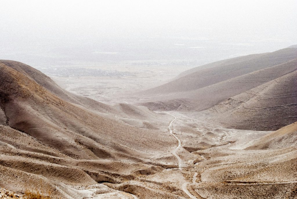 Judean Desert Jeep Tour aerial view of desert road winding through the Israeli wilderness