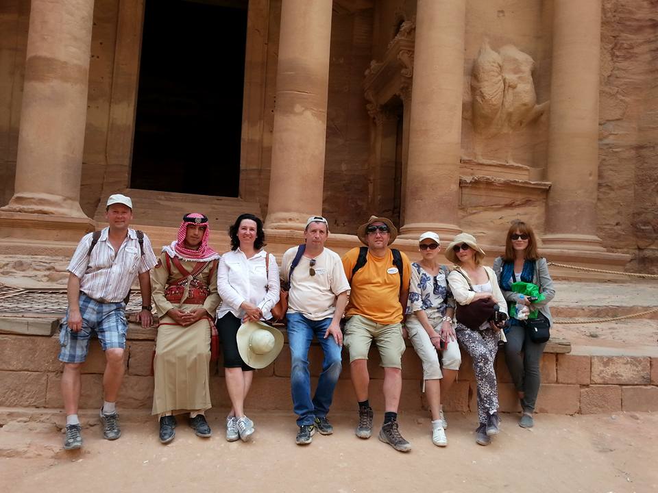 The rose-stone facade of Al-Khazneh at Petra with Booking-Tours