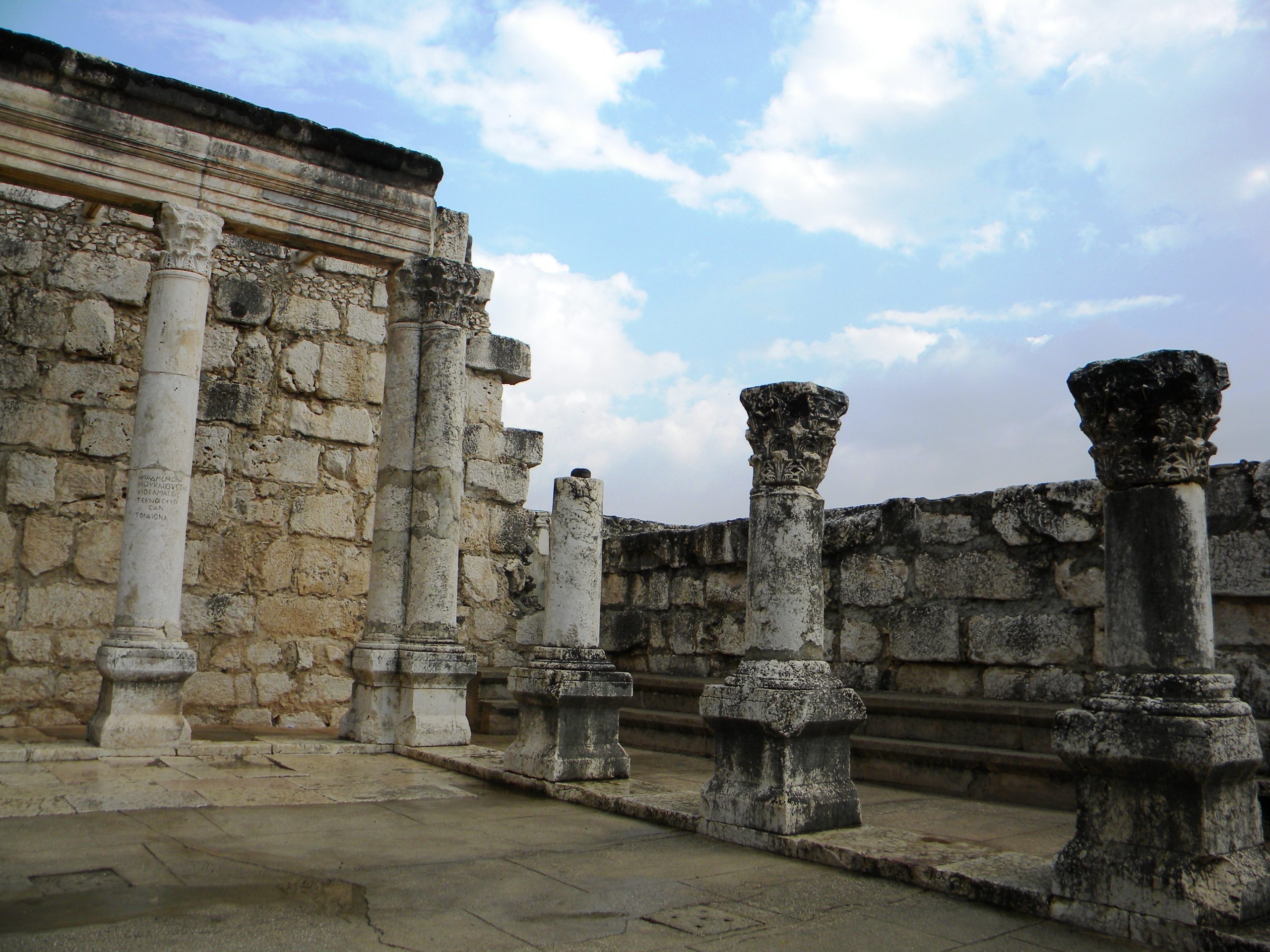 The white limestone ruins of the ancient synagogue at Capernaum on the shore of the Sea of Galilee in Israel