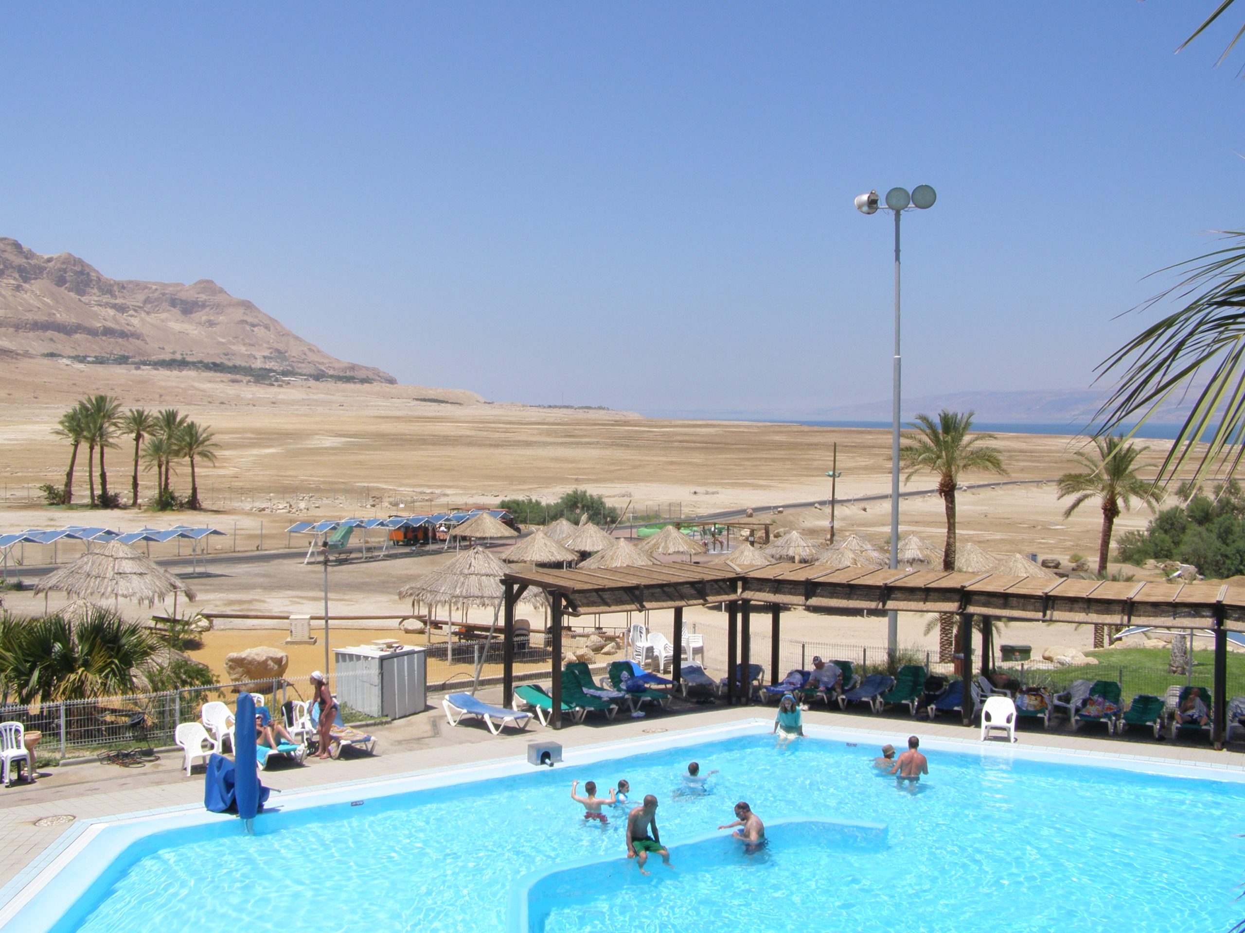 The Ein Gedi spa and Dead Sea shoreline where visitors take mud baths