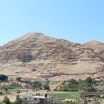 The Mount of Temptation and its cliffside monastery rising above the oasis city of Jericho
