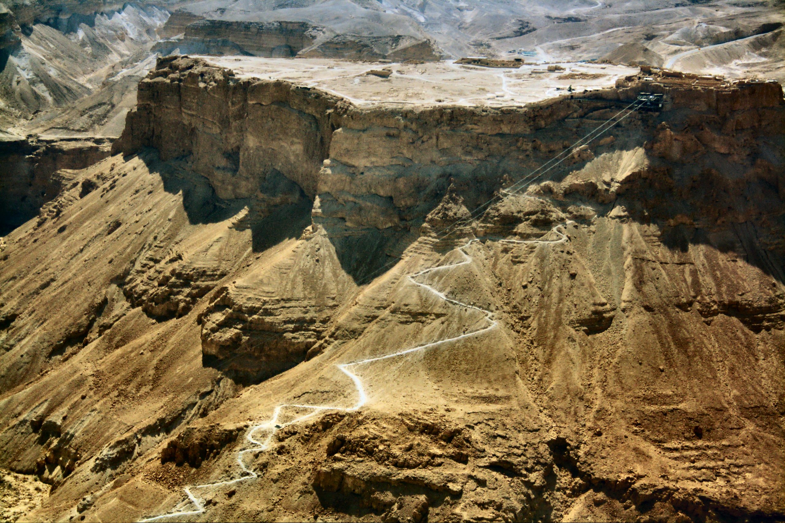 The cable car and the winding Snake Path leading up to the summit of Masada fortress