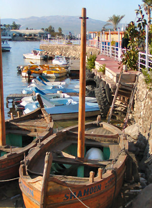 The lakeside town of Tiberias on the western shore of the Sea of Galilee in Israel, with boats on the water