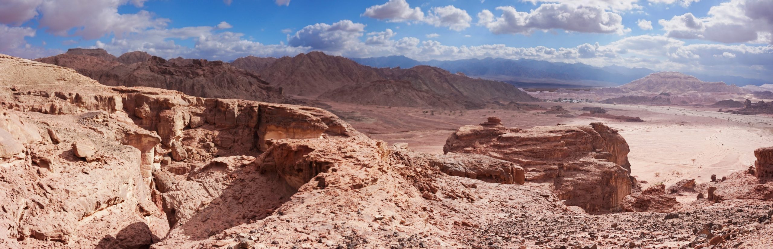 Panoramic desert landscape of Timna Park with red and ochre rock